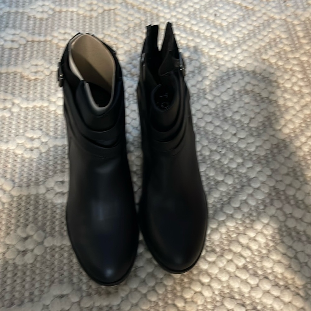 New in box black boots.